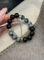 Holding Black-Gray Bracelet, Energy Resonance Of Stones & Silver Snake