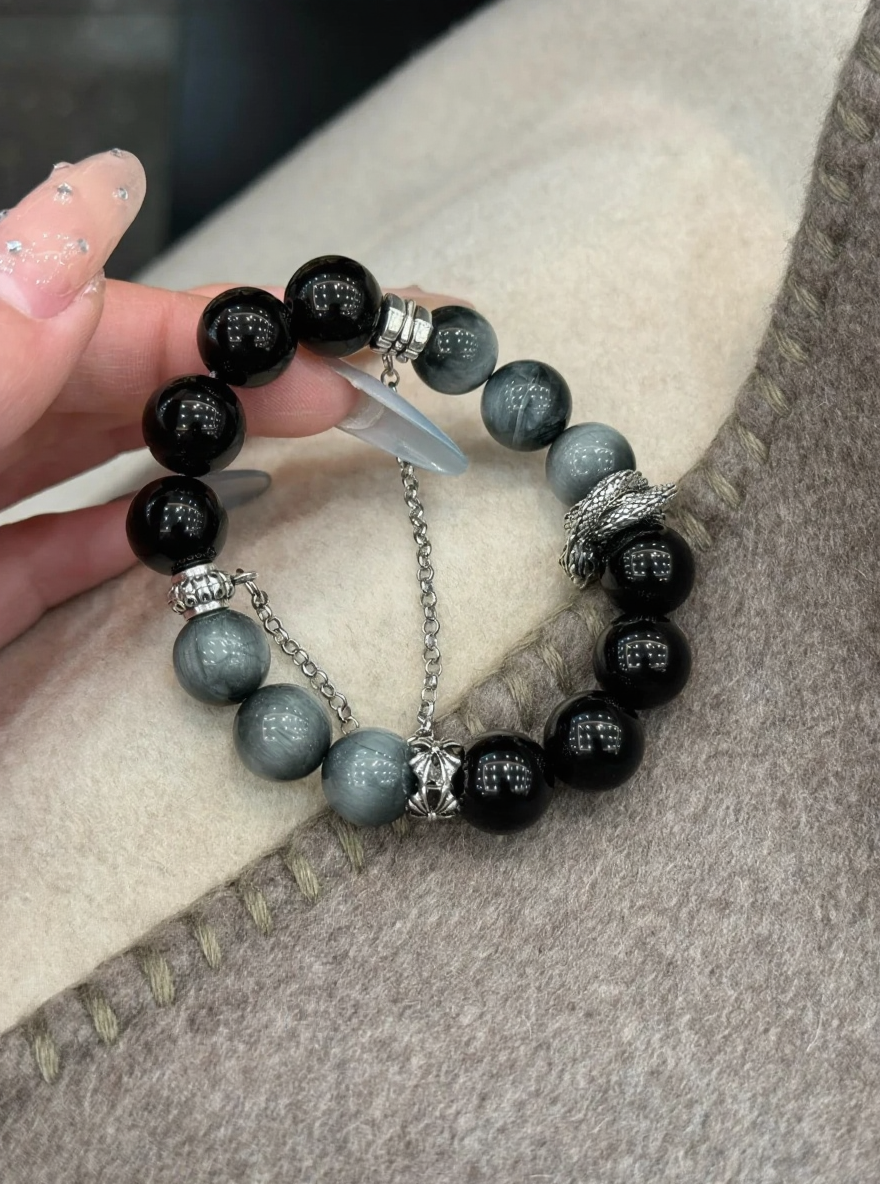 Holding Black-Gray Bracelet, Energy Resonance Of Stones & Silver Snake