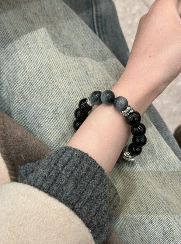 Displaying Black-Gray Bracelet On Wrist, Moment Of Aura Strengthening