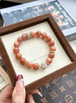 Orange Moonstone Bracelet Resting In Box, Quiet Charge Of Fire-Metal Energy