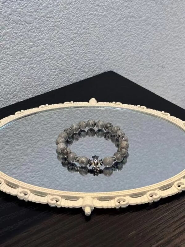 Close-Up Of Fire Stone Bracelet, 10mm Beads’ Fire Tension