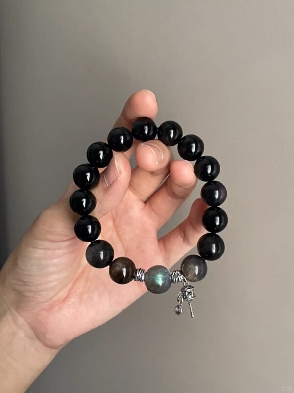 Holding 12mm Double-Eye Silver Obsidian Bracelet, Moonstone Labradorite & Black Gold Quartz Ignite Spiritual Field