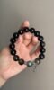 Holding 12mm Double-Eye Silver Obsidian Bracelet, Moonstone Labradorite & Black Gold Quartz Ignite Spiritual Field
