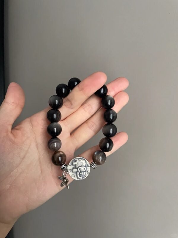 Dynamic Shot Of 12mm Silver Obsidian Bracelet, Metal Loop From Silver Elephant Pendant