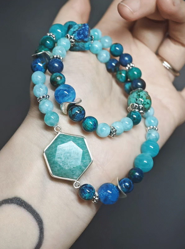 Wearing a double-strand bracelet with 4pcs 8mm Amazonite, 17pcs 6mm Amazonite, 19pcs 7mm Chrysocolla, 4pcs 10mm Chrysocolla, 1pc 13mm Chrysocolla, plus an Amazonite hexagon pendant and a Chrysocolla cube with silver accents
