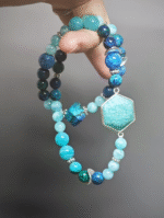 Close-up of the 8mm Amazonite hexagon pendant, a water-element spiritual guidance symbol