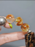 Details of Yellow Fire Quartz beads, fire-element passion wave