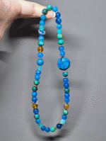 Close-up of Amber and Blue Apatite in sync, metal-element amplifying water-wood energy resonance