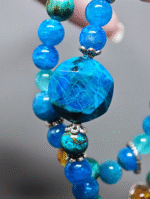 Close-up of the large 8mm Blue Apatite bead, core carrier of water-element energy