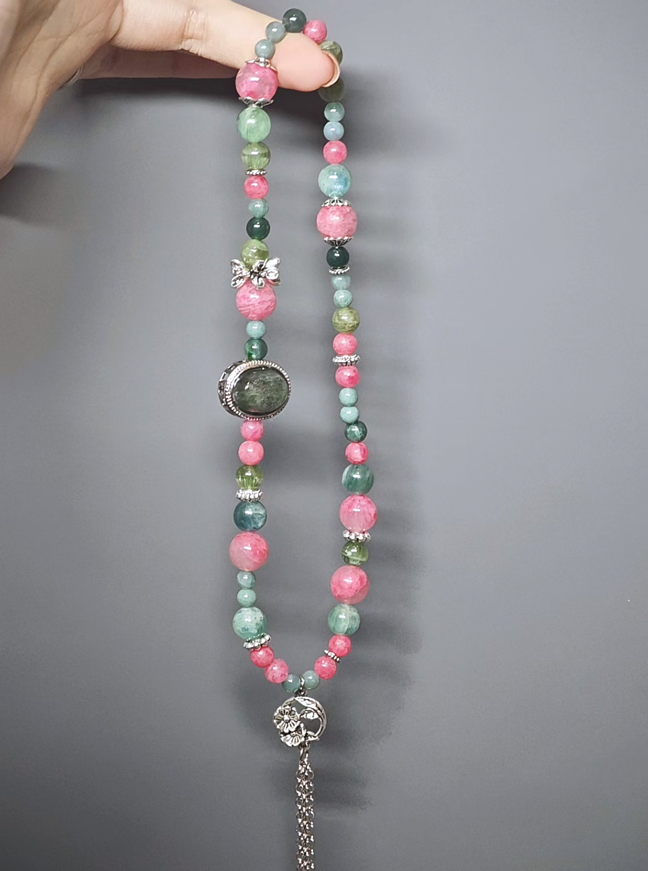 Close-up of Fuchsite and Grandidierite in sync, silver amplifying wood-earth resonance