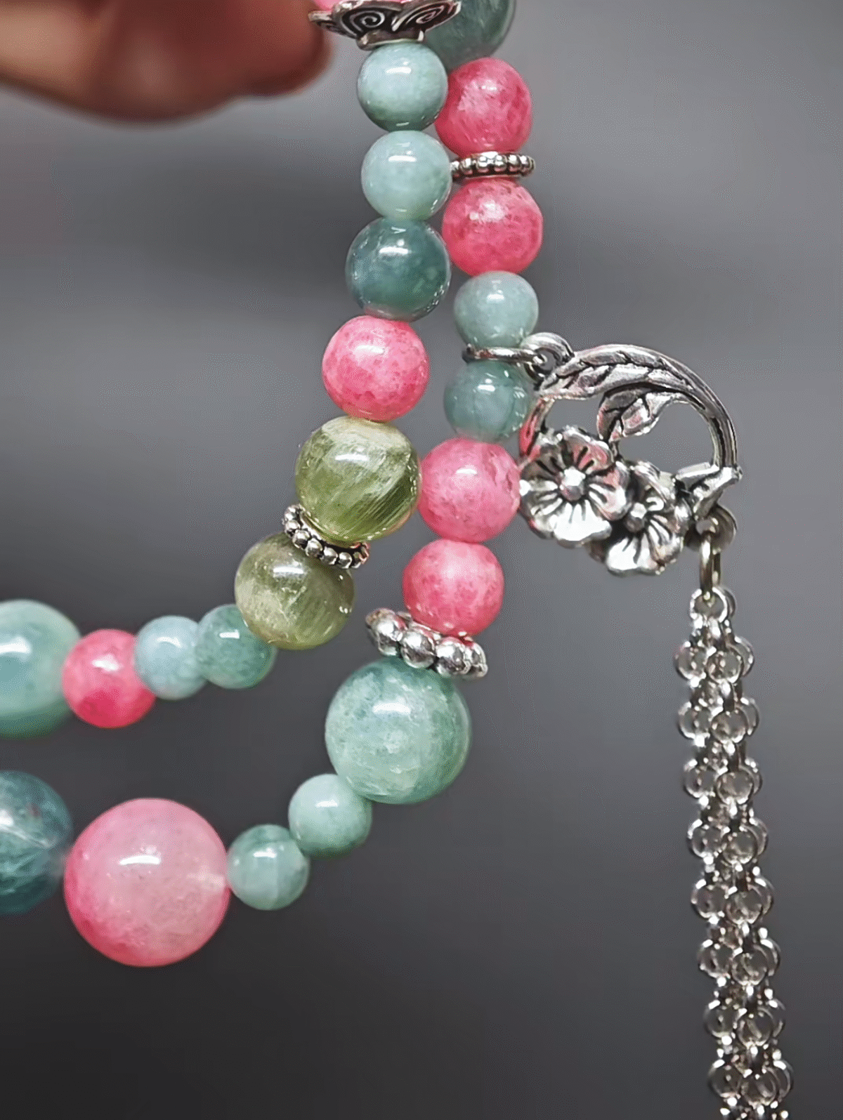 Double-strand bracelet displaying color layers of Fuchsite, Rhodonite, Blue-Green/Green Grandidierite, highlighting wood-fire-earth synergy