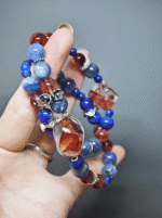 Dynamic display of the bracelet, resonating the breakthrough of Fire Quartz and the purification of Kyanite