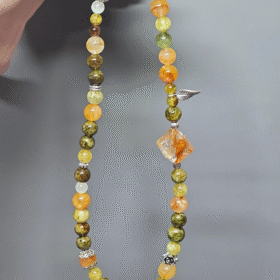 Close-up of silver and stones in sync, metal-element energy conductor