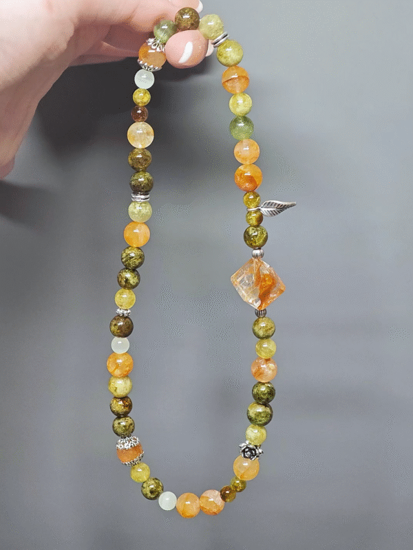 Close-up of silver and stones in sync, metal-element energy conductor