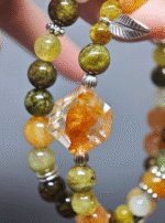 Close-up of 12pcs 9mm Yellow Fire Quartz beads, fire-element vitality wave from volcanic rock