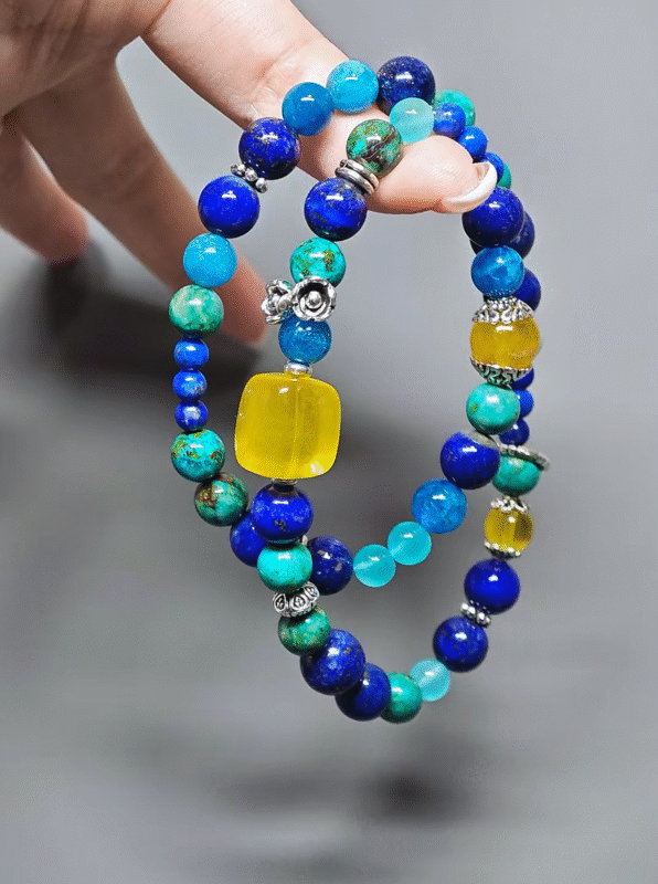 Close-up of 8mm Yellow Fluorite beads, earth-element stability wave