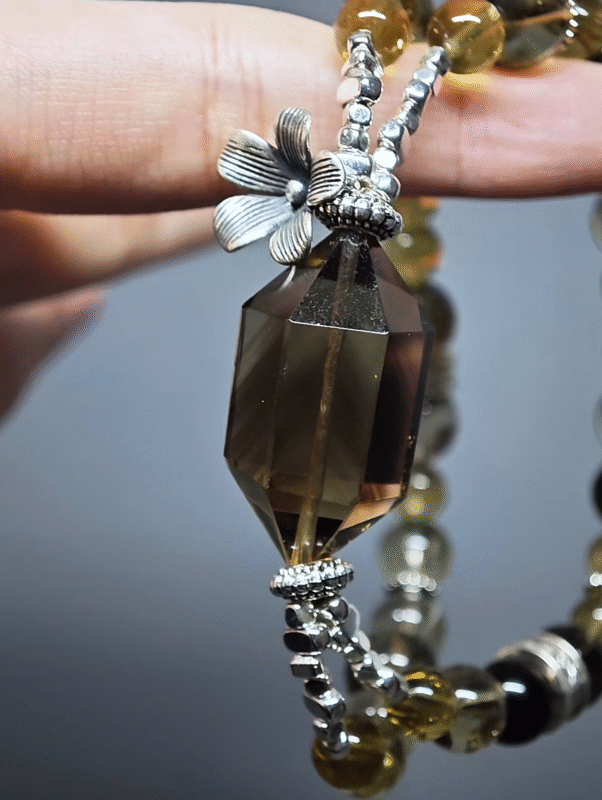 Close-up of the Smoky Quartz double-terminated point, core earth-element breakthrough engine