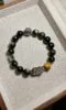 Close-up of Yellow Tiger Eye’s stripes, earth-element stability anchoring