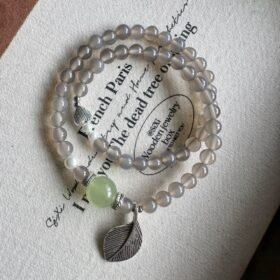Details of the Gray Agate, Xiu Jade, and White Shell bracelet, earth-wood-water energy for natural healing