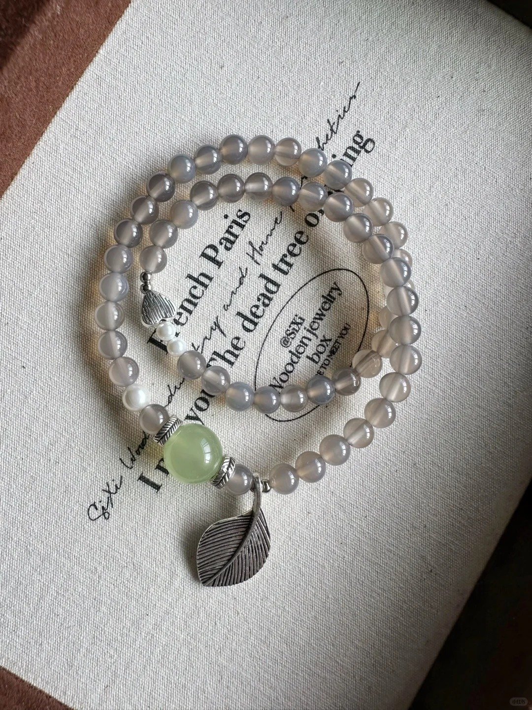 Details of the Gray Agate, Xiu Jade, and White Shell bracelet, earth-wood-water energy for natural healing