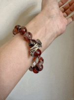 Wearing Blood Red Fire Quartz bracelet, fire-element awakens feminine inner power