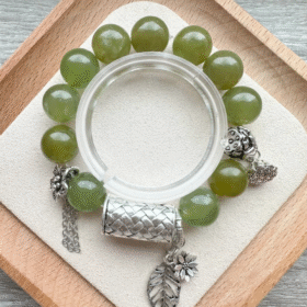 Detail of 14mm Xiu Jade bracelet, wood-metal synergy of jade and silver
