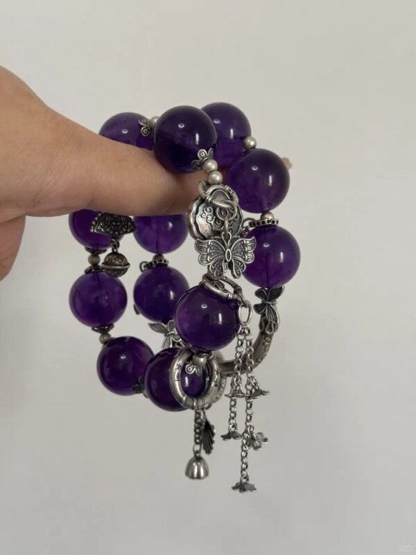 Wearing detail of Uruguay Amethyst bracelet, water-metal synergy between amethyst and silver