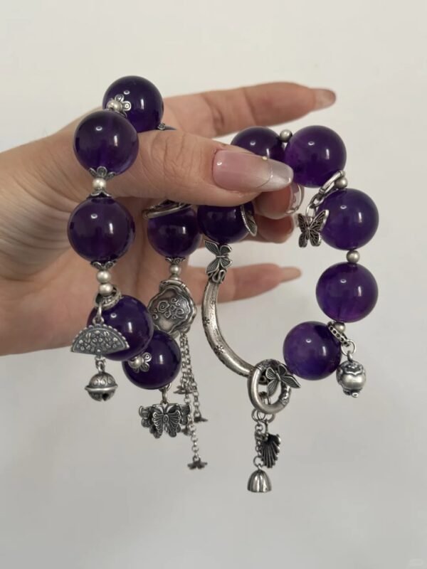 Wearing Uruguay Amethyst bracelet, water-element energy awakening spiritual awareness