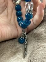 Close-up of Blue Apatite bracelet, silver totem’s water-metal secrets