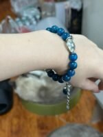 Wrist view of Blue Apatite bracelet, showing daily water-metal energy nourishment