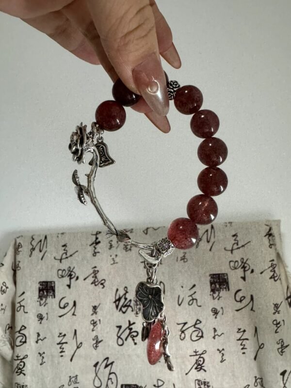 Wearing Strawberry Quartz bracelet, red-fire & metal energy blooms daily
