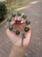 Full display of Green Grape Xiu Jade bracelet, wood-metal rural awakening