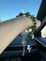 Wearing Green Grape Xiu Jade bracelet in car, wood-metal energy’s mobile protection