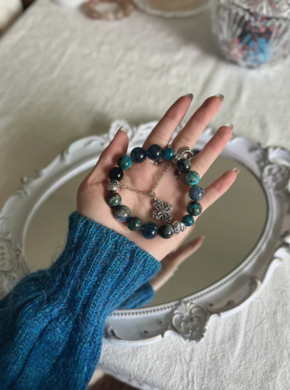 Wrist-worn multi-gem bracelet, blue-metal creative aura