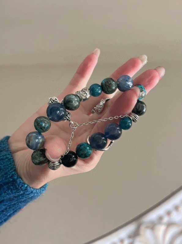 Layered beads of multi-gem bracelet, blue-metal gradient magic