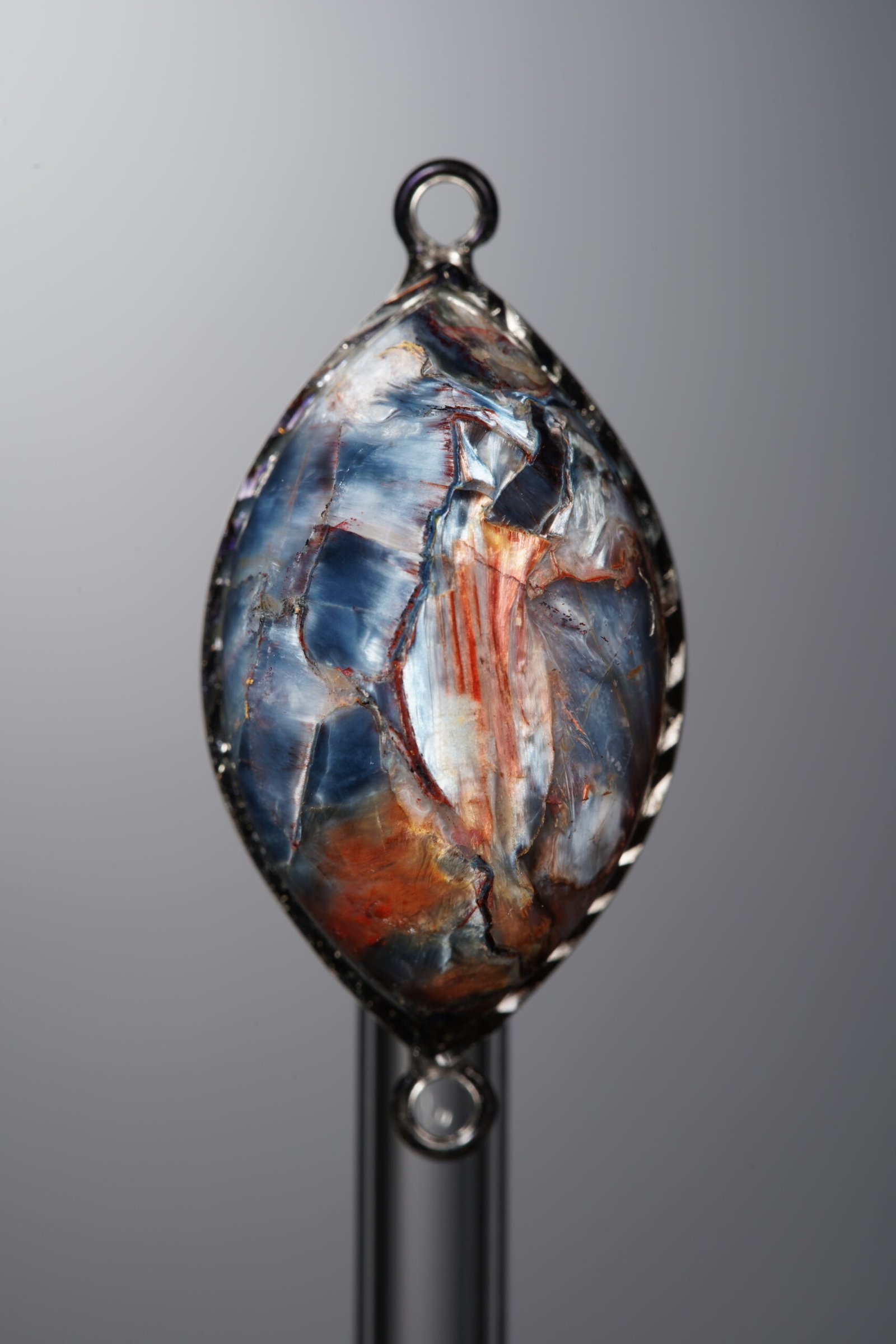 D2-161 (1) Pietersite-Brown&Blue-Marquise Plaque w/ Double Ear Silver Frame-33mm - Image 1