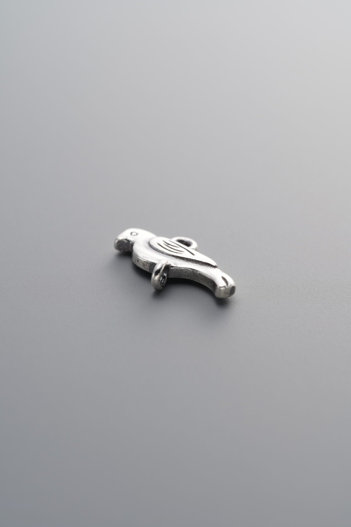 925 Sterling Silver-Antiqued-Bird Double-Eye Charm-12mm - Image 1
