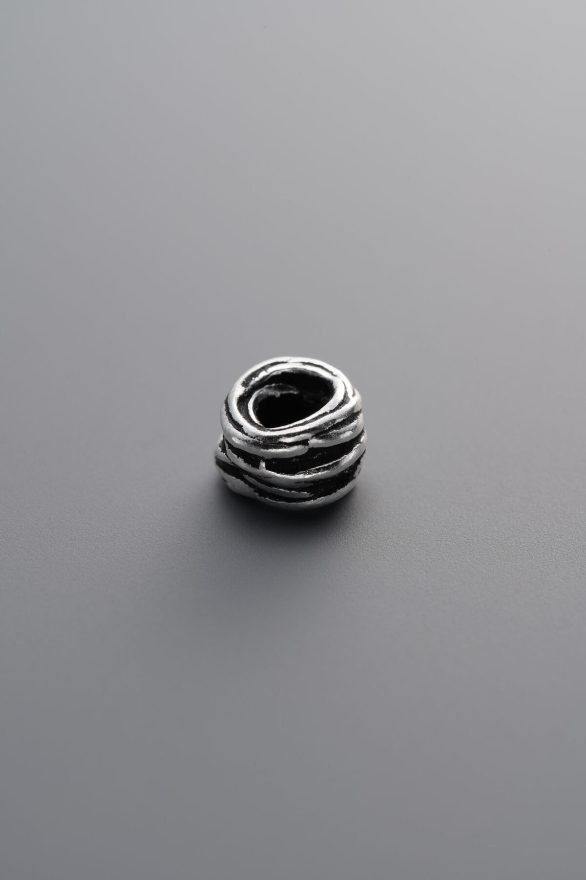 925 Sterling Silver-Antiqued-Intertwined Coil Spacer Bead-7mm - Image 1