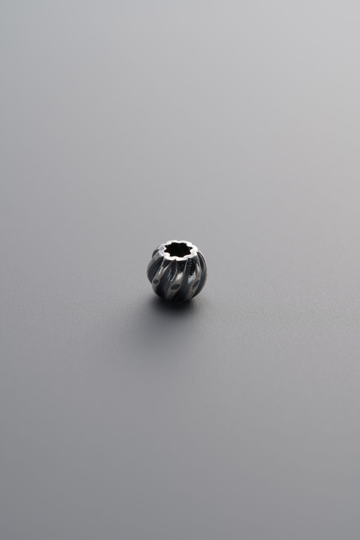 925 Sterling Silver-Antiqued-Melon-Patterned Spacer Bead-4mm - Image 1