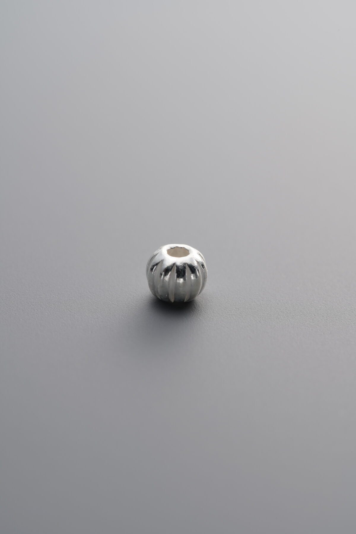 925 Sterling Silver-Bright-Melon-Patterned Spacer Bead-4mm - Image 1