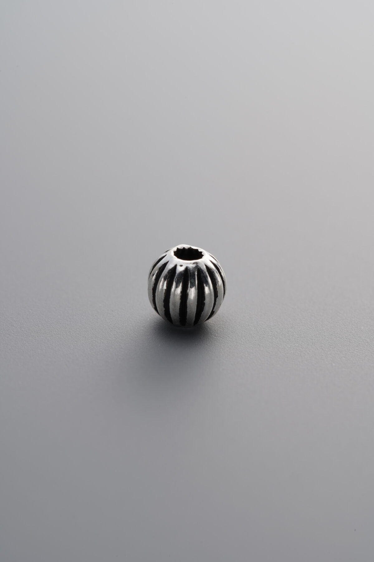 925 Sterling Silver-Antiqued-Melon-Patterned Spacer Bead-5mm - Image 1