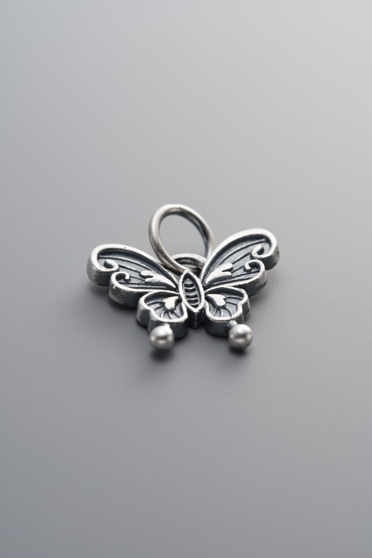 925 Sterling Silver-Antiqued-Butterfly Pendant-13mm - Image 1