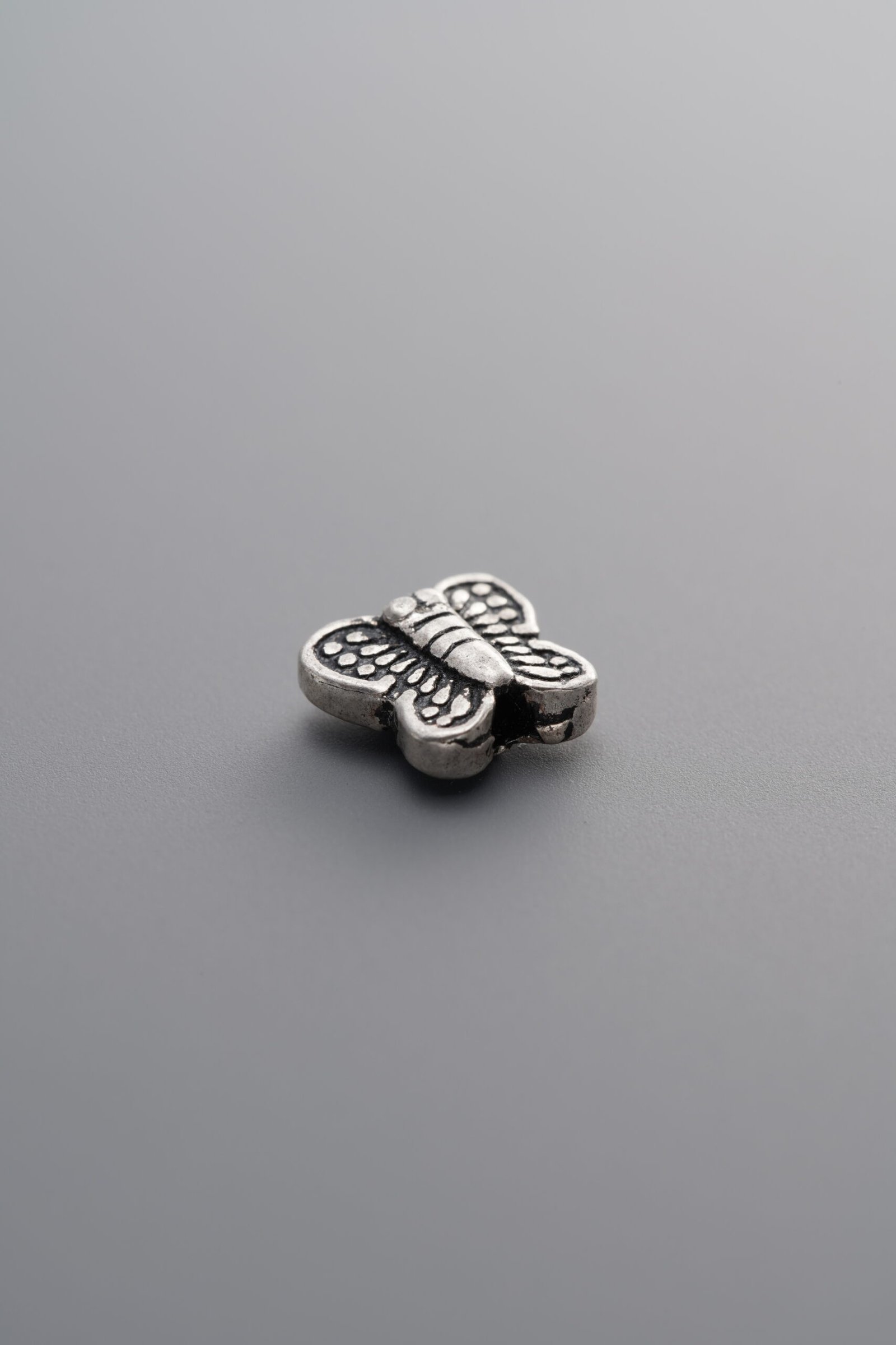 E6-18 (1) Butterfly Spacer Bead