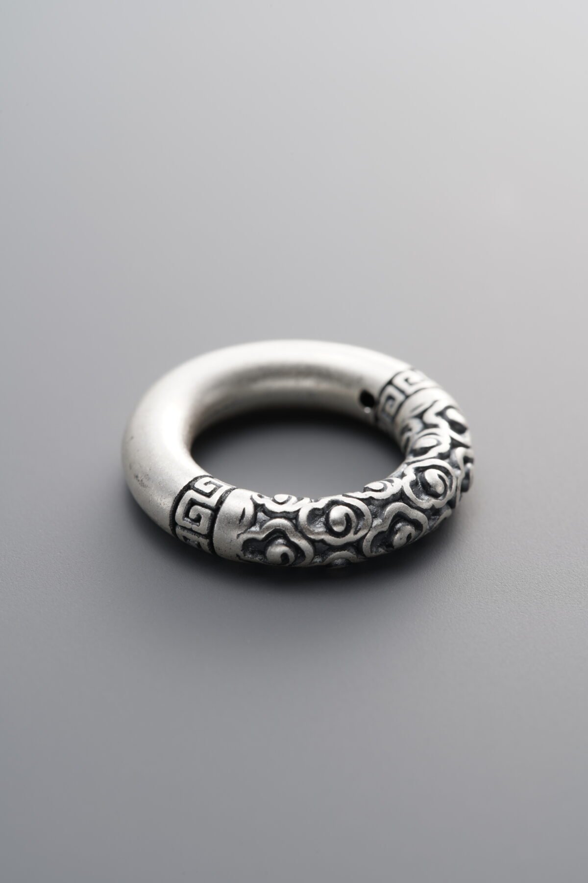 999 Fine Silver-Antiqued-Dimensional Auspicious Cloud Fret Pattern Slider Bail-18mm - Image 1