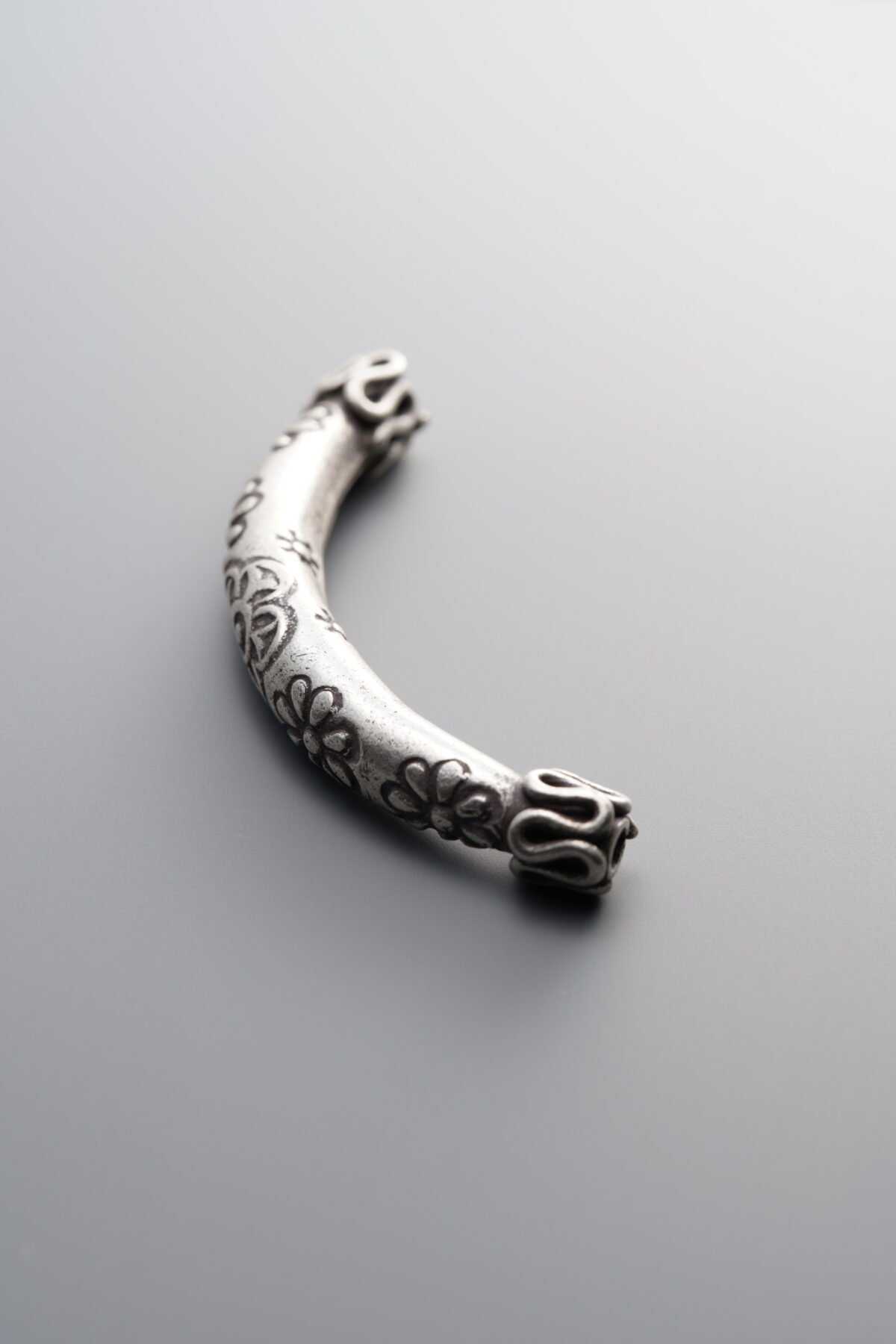 999 Fine Silver-Antiqued-Patterned Curved Tube-44mm - Image 1