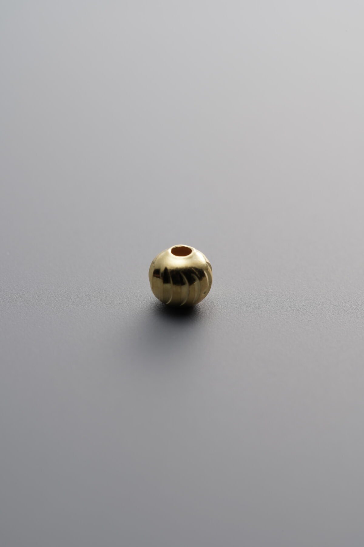 925 Sterling Silver-Gold Plated-Curved Knife Round Spacer Bead-4mm - Image 1