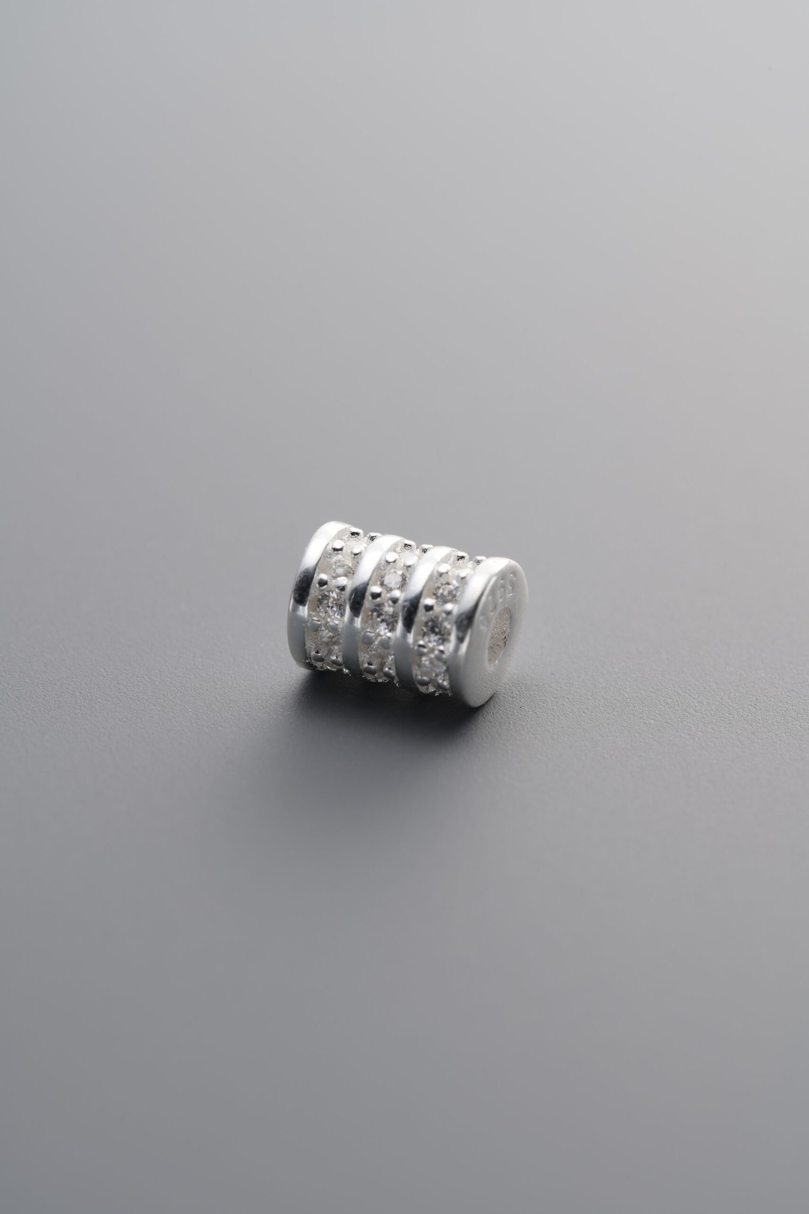 F3-68 (2) 925 Silver-Plain-Zircon Triple-row Wheel-shaped Bead-5mm - Image 1